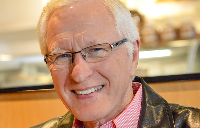 Close up of a mature man with glasses